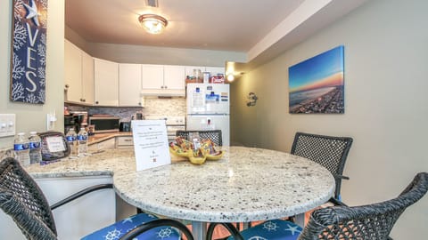 Dine in after a Day of Beach, Sun & Fun on this granite table ~ seats 4 people