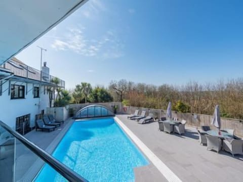 Watch kids in pool and the sunset from the balcony