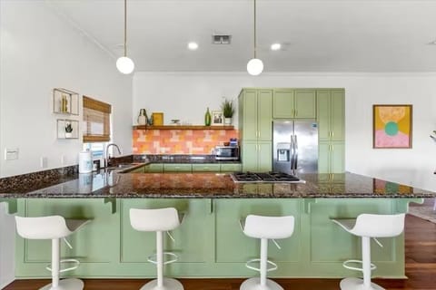 A kitchen you'll enjoy cooking in- fully loaded with anything you need