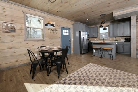 Breakfast nook & kitchen completely open to living room and large dining table