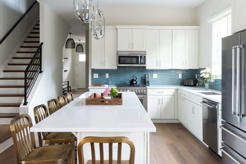 Taylor Haus I - Bring friends and family together at the kitchen bar and let laughter and stories flow freely.