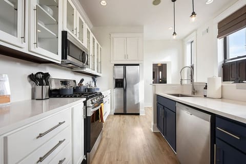 Fully equipped kitchen with stainless appliances