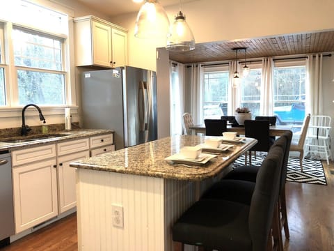 Open concept kitchen. Island seats 3.  Table seats up to 6 comfortably.