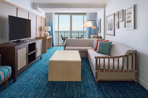 Unwind on the sofa with a calming oceanview backdrop.