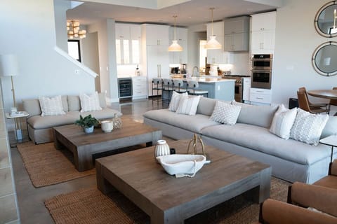 Living area featuring a 60 in TV.