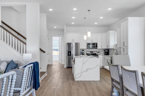 Open concept living, kitchen, and dining area