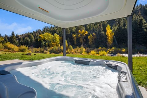 Private hot tub overlooking the river.