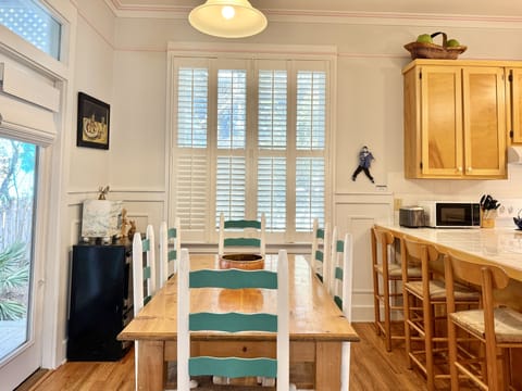 DINING AREA FOR 6 AND BARTOP SEATING FOR 3 IN KITCHEN