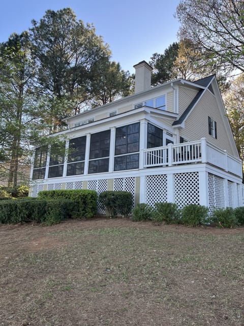 Expansive porch with grilling deck, overlooking lake