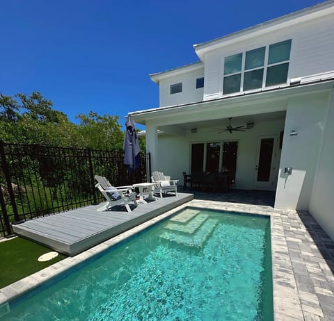 Escape to your own slice of heaven with a refreshing swim, BBQ feast, and endless fun in our fenced backyard retreat.