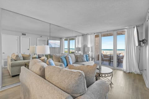 In our beachfront retreat, featuring comfortable accommodations and serene ocean views.