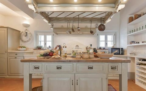 Amenities, Balcony / Terrace / Patio, Building Exterior, Garden, Pool, Spring, Summer