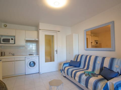 Furniture, Property, Laundry Room, Cabinetry, Azure, Lighting, Interior Design, Wood, Flooring, Floor