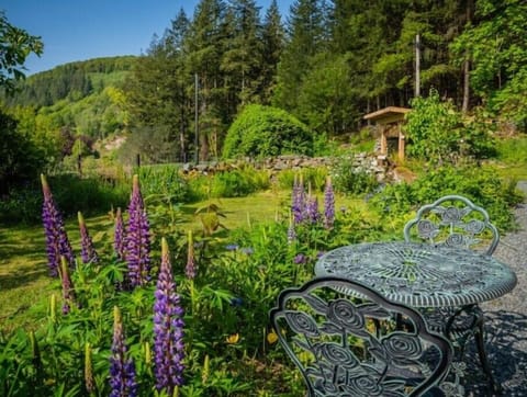 Front garden with incredible views and seating for guests to enjoy.