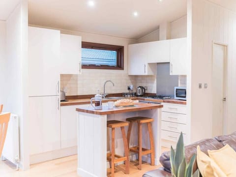 Kitchen area, equipped with microwave, oven, hob, fridge/freezer and dishwasher