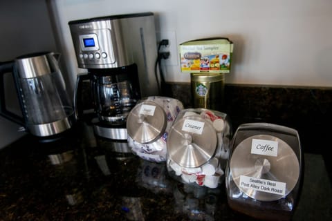 Complimentary coffee, tea, hot cocoa, cream and sugar.