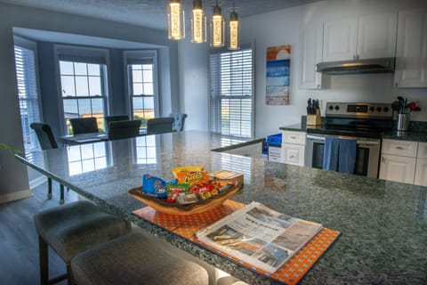2nd and 3rd floor have identical kitchens w/large island and beach views.