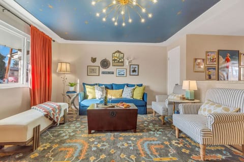 Elegant lounge under a sparkling chandelier.