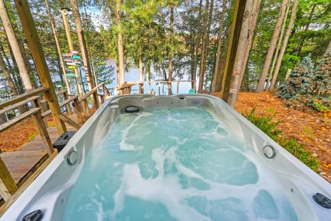 Relax in the hot tub as you overlook the peaceful lake
