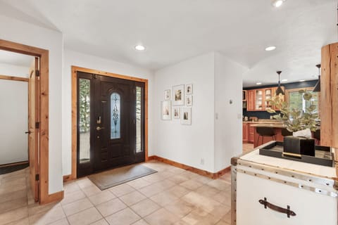 The spacious Foyer offers plenty of room for guests to gather, and prepare for their adventure in the mountains.