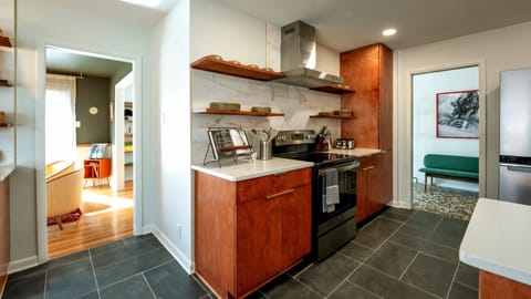 🚪Original pocket doors form intimate dining and entertaining spaces! 