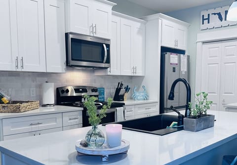 Complete Kitchen 
New Washer and Dryer 
New A/C Unit 
New Grill 