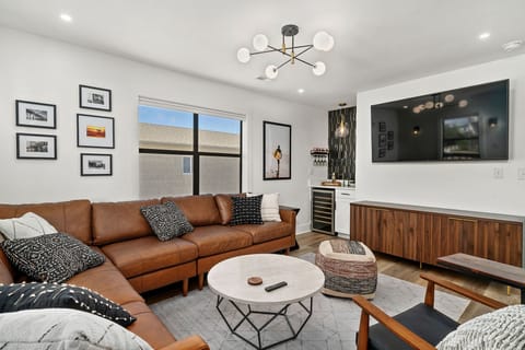 Large living area comfortably seats 7 adults.