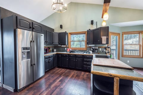 The Kitchen includes modern appliances and primary cooking needs!