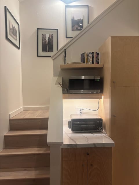 Microwave and toaster oven. Full size oven, cook top and dishwasher. Ice-maker