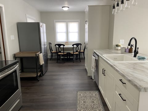 Kitchen with small eating area