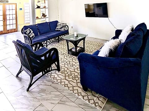 New furniture mixed with classic rattan balance the old and new in the home.