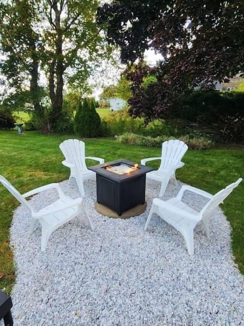Gather around our outdoor gas fire pit for cozy evenings under the stars!