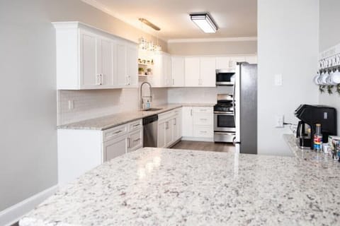 Bright white kitchen - well-equipped | upgraded stainless appliances