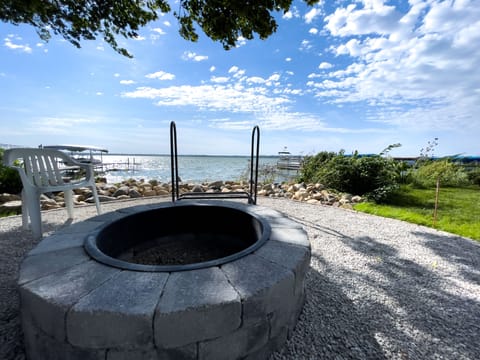 Private fireplace with supplied firewood for guest use