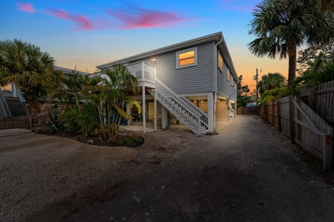 A charming coastal home just across the street from the beach, perfect for families or a small group getaway.