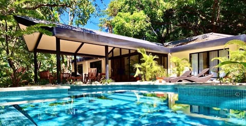 Enjoy the pool while watching monkeys above