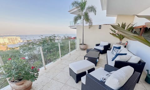 Private outdoor living space with views of the bay and Marina Riviera Nayarit