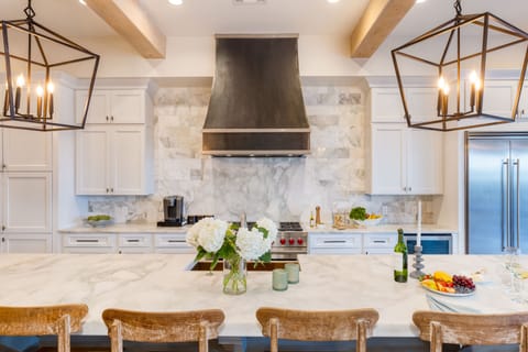 Large kitchen island with barstool seating.