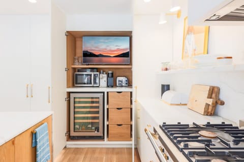 Hidden Bar Area | TV, Coffee Station, Microwave, glassware