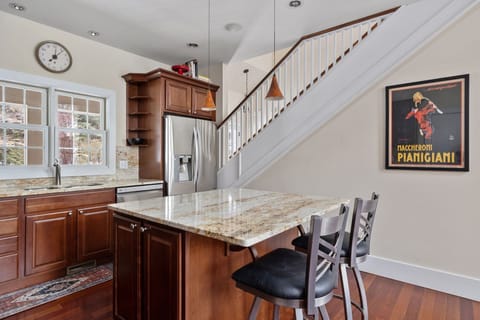 Want a snack or cup of morning coffee? Gather round the kitchen island, y'all!