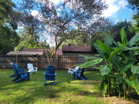 Fully fenced in yard for added privacy. Outdoor seating & firepit. 