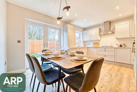 Seamless indoor-outdoor living — dine with stunning patio views.