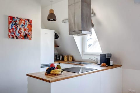 The kitchen is fully equipped to prepare a simple meal