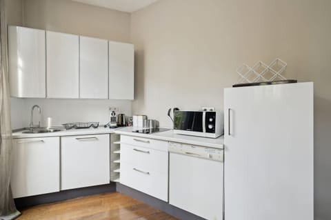 The kitchen is fully equipped to prepare a simple meal