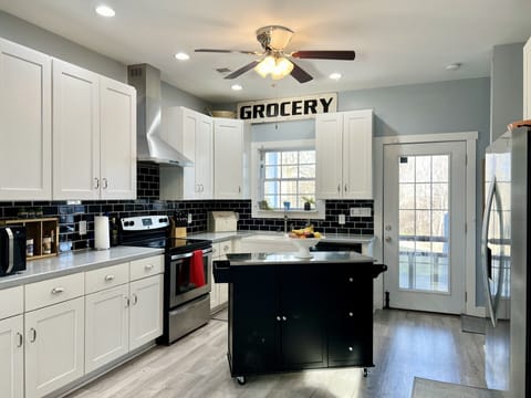 Bright, airy fully equipt kitchen.  Loads of ceiling fans throughout the home.