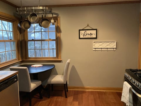 extra seating in kitchen with views of the water and treed landscapes
