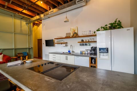 Kitchen with stovetop range and separate oven