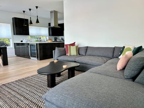 Large family room with TV, fireplace and gorgeous views from every angle!