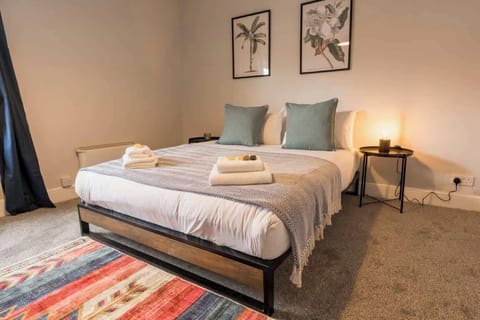 Upstairs Master bedroom:  Super spacious bedroom with King bed.  The perfect space to unwind.