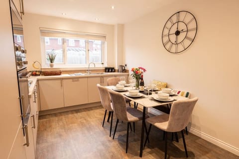 The Kitchen/Dining Area: with all the modern amenities you could need, the kitchen comes well equipped.